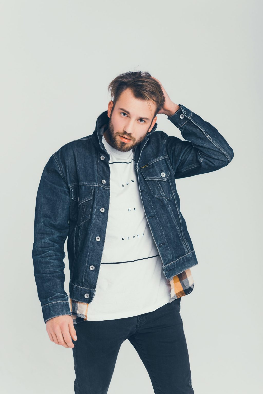 young beard  man posing in the studio